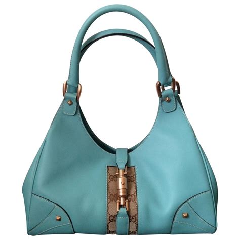 gently used blue gucci leather hobo bag|Gucci hobo bag vintage.